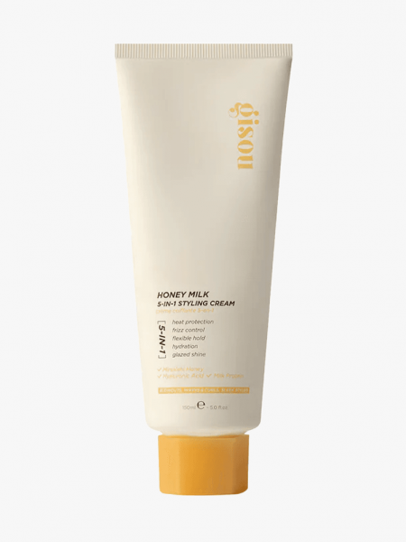 Gisou Honey Milk 5-in-1 Styling Cream in branded tube component on a light gray background